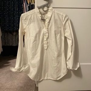 White over the head half button up with ruffle detail